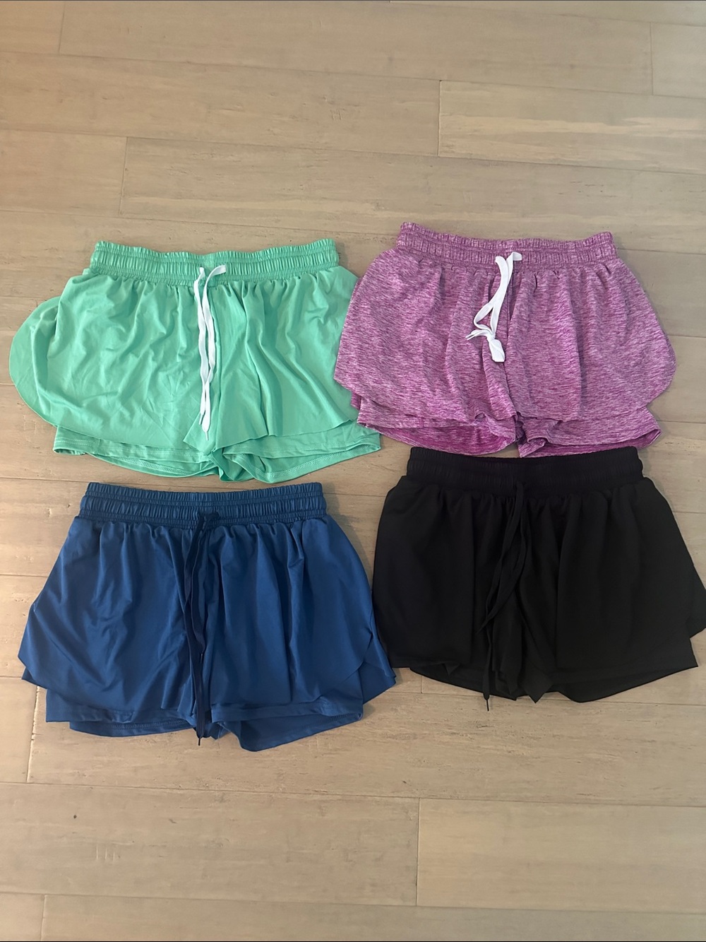 Real Essentials 4 Pack of Flowy Dry Fit Running Short - Spandex Underneath Gym